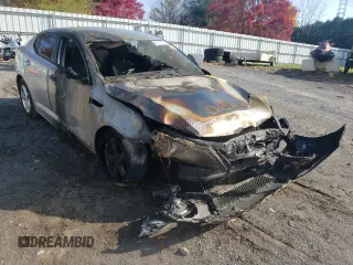 2015 Kia Optima LX z VIN 5XXGM4A71FG518535, wystawiony jako Copart lot #65218972 z przebiegiem Nie podano mil oraz Szkoda całkowita • Salvage title. Historia ofert i sprzedaży dostępna na DreamBid. Obrazek 1.