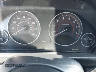 2015 BMW 4 Series 428i xDrive with VIN WBA4C9C54FD330582, listed as a IAAI auction lot 42135691 with 127,289 mi miles and . Bid and sale history available at DreamBid. Image 7.