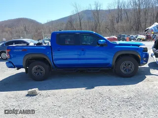 2025 Nissan Frontier PRO-4X with VIN 1N6ED1EK0SN614348, listed as a IAAI auction lot 41826627 with 6,931 mi miles. Bid and sale history available at carsss.com. Image 13.