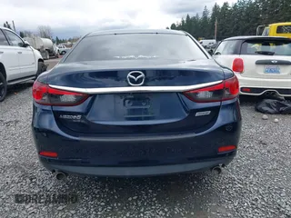 2015 Mazda 6 i Touring with VIN JM1GJ1V52F1185998, listed as a IAAI auction lot 41921373 with 101,306 mi miles and . Bid and sale history available at DreamBid. Image 17.