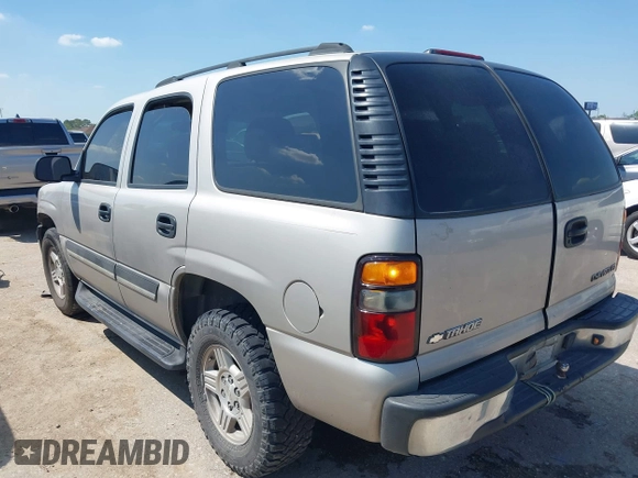 2004 Chevrolet Tahoe LS z VIN 1GNEC13V74R260589, wystawiony jako IAAI lot #41783855 z przebiegiem 289 246 mil mil oraz . Historia ofert i sprzedaży dostępna na DreamBid. Obrazek 3.
