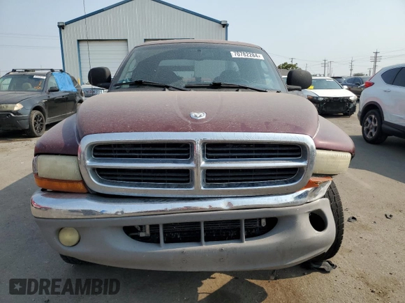 2000 Dodge Dakota Sport with VIN 1B7GG2AN1YS699073, listed as a Copart auction lot 70782284 with 141,876 mi miles and Salvage Title. Bid and sale history available at carsss.com. Image 5.