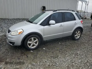 2009 Suzuki SX4 with VIN JS2YB413195101423, listed as a Copart auction lot 85321624 with 127,917 mi miles and Salvage Title. Bid and sale history available at carsss.com. Image 1.