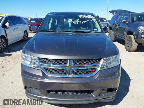 2015 Dodge Journey SE z VIN 3C4PDCAB5FT739266, wystawiony jako IAAI lot #41725086 z przebiegiem 134 109 mil mil oraz . Historia ofert i sprzedaży dostępna na DreamBid. Obrazek 12.