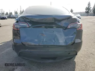 2024 Tesla Model Y Long Range with VIN 7SAYGDEE2RA244242, listed as a Copart auction lot 52635095 with 4,994 mi miles and Salvage title. Bid and sale history available at DreamBid. Image 6.