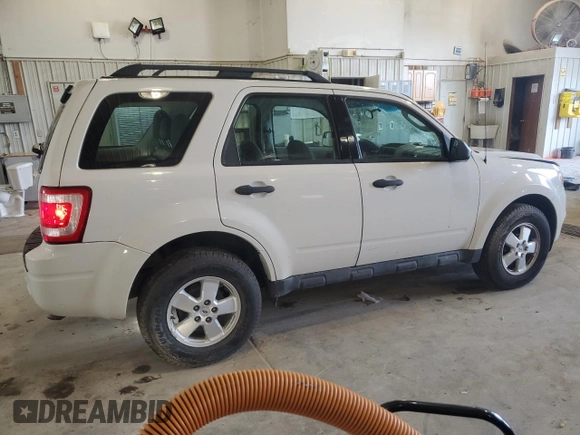 2012 Ford Escape XLS с VIN 1FMCU9C73CKA35456, выставлен на аукционе Copart как лот 54230285 с пробегом 174 263 миль миль и Списание • Salvage title. История ставок и продаж доступна на DreamBid. Изображение 3.