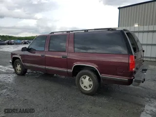 1999 Chevrolet Suburban with VIN 3GNEC16RXXG260623, listed as a Copart auction lot 54609694 with 246,460 mi miles and Salvage Title. Bid and sale history available at carsss.com. Image 2.