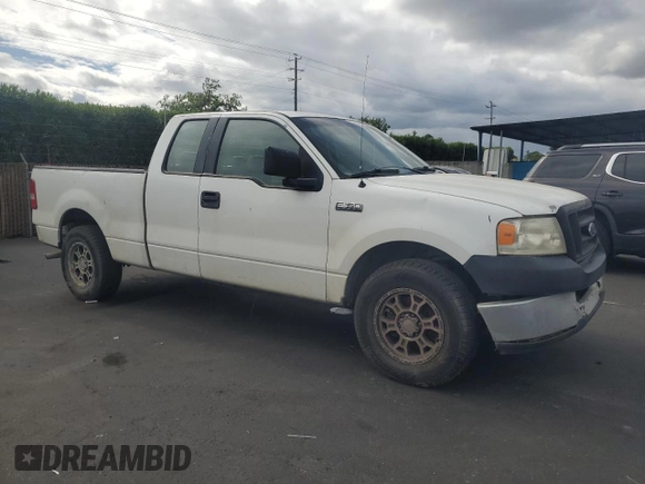 2005 Ford F-150 STX with VIN 1FTRX12W15FB65991, listed as a Copart auction lot 54858525 with 281,477 mi miles and Salvage Title. Bid and sale history available at carsss.com. Image 4.