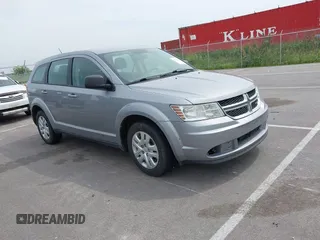 2015 Dodge Journey SE z VIN 3C4PDCAB4FT584550, wystawiony jako IAAI lot #42393848 z przebiegiem 152 194 mil mil oraz . Historia ofert i sprzedaży dostępna na DreamBid. Obrazek 1.
