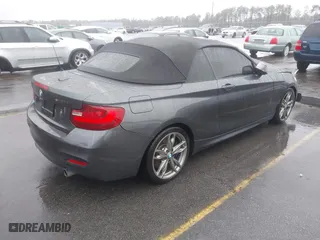 2015 BMW 2 Series M235i with VIN WBA1M1C50FV393092, listed as a IAAI auction lot 41507537 with 79,321 mi miles. Bid and sale history available at carsss.com. Image 4.
