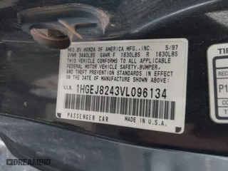 1997 Honda Civic EX with VIN 1HGEJ8243VL096134, listed as a IAAI auction lot 41929243 with 206,195 mi miles. Bid and sale history available at carsss.com. Image 9.