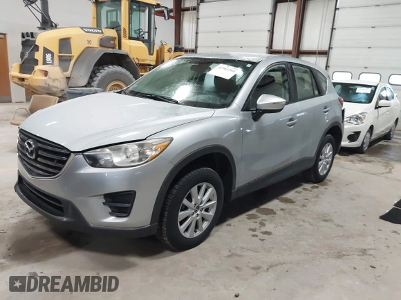 2016 Mazda CX-5 Sport with VIN JM3KE2BY2G0718434, listed as a IAAI auction lot 41961364 with 145,748 mi miles. Bid and sale history available at carsss.com. Image 17.