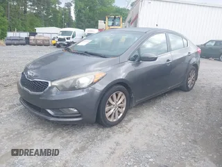 2014 Kia Forte EX with VIN KNAFX4A82E5086095, listed as a IAAI auction lot 42118745 with 151,040 mi miles. Bid and sale history available at carsss.com. Image 2.