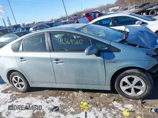 2013 Toyota Prius One z VIN JTDKN3DU3D1617773, wystawiony jako IAAI lot #41369560 z przebiegiem 91 962 mil mil oraz . Historia ofert i sprzedaży dostępna na DreamBid. Obrazek 14.