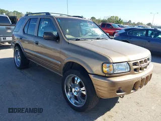 2001 Isuzu Rodeo S with VIN 4S2CK58W014326747, listed as a IAAI auction lot 41229950 with 190,277 mi miles and . Bid and sale history available at DreamBid. Image 1.
