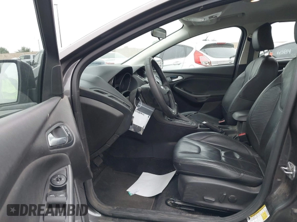 2015 Ford Focus SE with VIN 1FADP3K27FL387012, listed as a IAAI auction lot 42100945 with 85,588 mi miles. Bid and sale history available at carsss.com. Image 5.
