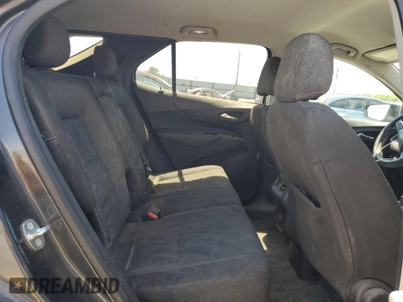 2018 Chevrolet Equinox LT z VIN 2GNAXJEV6J6142654, wystawiony jako Copart lot #60076885 z przebiegiem 93 353 mil mil oraz Szkoda całkowita • Salvage title. Historia ofert i sprzedaży dostępna na DreamBid. Obrazek 11.