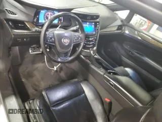 2014 Cadillac ELR z VIN 1G6RL1E40EU601704, wystawiony jako Copart lot #88233495 z przebiegiem 136 665 mil mil oraz Tytuł czysty. Historia ofert i sprzedaży dostępna na DreamBid. Obrazek 8.