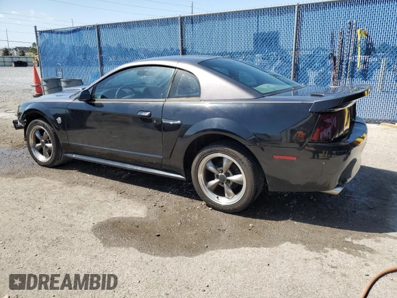 2004 Ford Mustang Standard with VIN 1FAFP40484F121187, listed as a Copart auction lot 52728965 with 175,692 mi miles and Salvage Title. Bid and sale history available at carsss.com. Image 2.