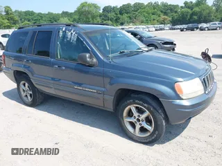 2002 Jeep Grand Cherokee Limited z VIN 1J4GX58S02C231960, wystawiony jako IAAI lot #42608115 z przebiegiem 101 083 mil mil oraz . Historia ofert i sprzedaży dostępna na DreamBid. Obrazek 1.
