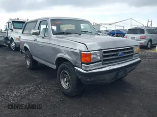 1987 Ford Bronco Custom with VIN 1FMEU15H4HLA38822, listed as a IAAI auction lot 41980537 with 81,328 mi miles. Bid and sale history available at carsss.com. Image 6.