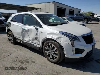 2021 Cadillac XT5 AWD Sport with VIN 1GYKNHRS2MZ156923, listed as a Copart auction lot 52696375 with 19,619 mi miles and Salvage title. Bid and sale history available at DreamBid. Image 4.