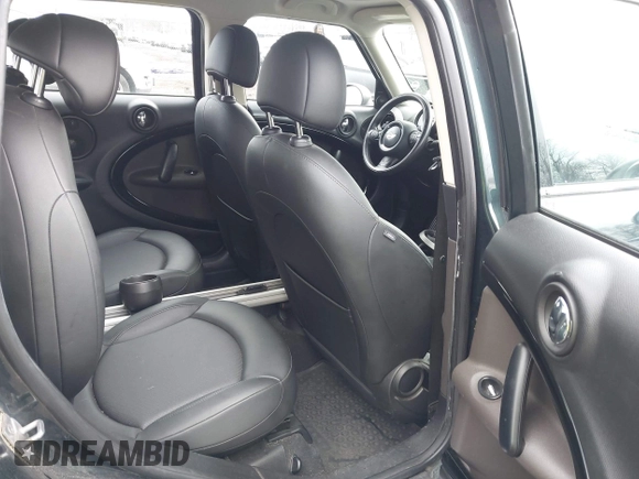 2011 MINI Countryman S with VIN WMWZC5C54BWL54135, listed as a IAAI auction lot 42034897 with 130,082 mi miles and . Bid and sale history available at DreamBid. Image 8.