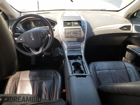 2014 Lincoln MKZ Hybrid z VIN 3LN6L2LU3ER806204, wystawiony jako Copart lot #56291185 z przebiegiem 258 082 mil mil oraz Szkoda całkowita • Salvage title. Historia ofert i sprzedaży dostępna na DreamBid. Obrazek 8.
