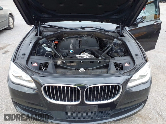 2014 BMW 7 Series 740Li with VIN WBAYE4C51ED138744, listed as a IAAI auction lot 42254213 with 116,157 mi miles and . Bid and sale history available at DreamBid. Image 10.