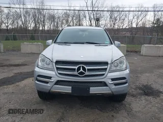 2012 Mercedes-Benz GL 450 z VIN 4JGBF7BE3CA765156, wystawiony jako IAAI lot #42035869 z przebiegiem 208 281 mil mil oraz . Historia ofert i sprzedaży dostępna na DreamBid. Obrazek 12.
