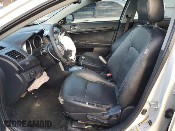 2017 Mitsubishi Lancer ES with VIN JA32V2FW3HU002880, listed as a Copart auction lot 88134085 with 129,954 mi miles and Salvage Title. Bid and sale history available at carsss.com. Image 7.