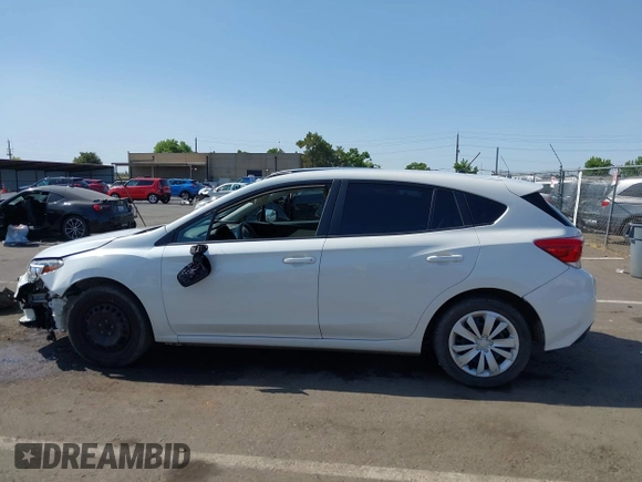 2018 Subaru Impreza with VIN 4S3GTAA64J3717886, listed as a IAAI auction lot 42572412 with 91,911 mi miles and . Bid and sale history available at DreamBid. Image 14.