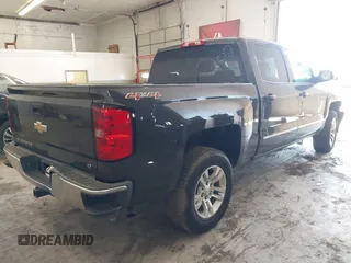 2014 Chevrolet Silverado 1500 LT with VIN 3GCUKREC6EG255502, listed as a IAAI auction lot 41861164 with 164,708 mi miles and . Bid and sale history available at DreamBid. Image 4.