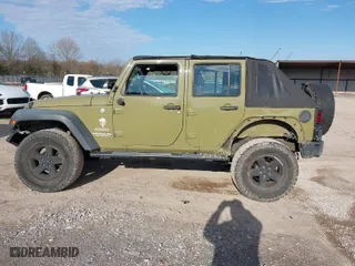 2013 Jeep Wrangler Unlimited Sport with VIN 1C4BJWDG5DL577949, listed as a IAAI auction lot 41837172 with 142,235 mi miles. Bid and sale history available at carsss.com. Image 14.