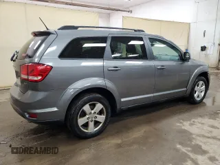 2012 Dodge Journey SXT with VIN 3C4PDCBG1CT353210, listed as a Copart auction lot 48863415 with 122,904 mi miles and Clean title. Bid and sale history available at DreamBid. Image 3.