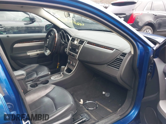 2010 Chrysler Sebring Limited with VIN 1C3CC5FB3AN176415, listed as a IAAI auction lot 42031905 with 105,765 mi miles. Bid and sale history available at carsss.com. Image 5.