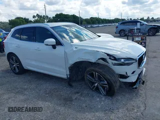 2021 Volvo XC60 Momentum with VIN YV4102DK6M1826828, listed as a IAAI auction lot 40603154 with 58,124 mi miles and . Bid and sale history available at DreamBid. Image 1.