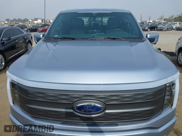 2022 Ford F-150 Lightning Pro z VIN 1FTVW1EL0NWG16234, wystawiony jako IAAI lot #41220079 z przebiegiem 40 541 mil mil oraz . Historia ofert i sprzedaży dostępna na DreamBid. Obrazek 10.