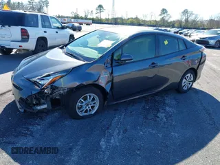2017 Toyota Prius Two z VIN JTDKARFU4H3042976, wystawiony jako IAAI lot #41740418 z przebiegiem 66 734 mil mil oraz . Historia ofert i sprzedaży dostępna na DreamBid. Obrazek 2.