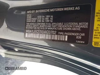 2014 BMW 2 Series M235i with VIN WBA1J7C51EVX33702, listed as a IAAI auction lot 41713337 with 83,076 mi miles. Bid and sale history available at carsss.com. Image 9.