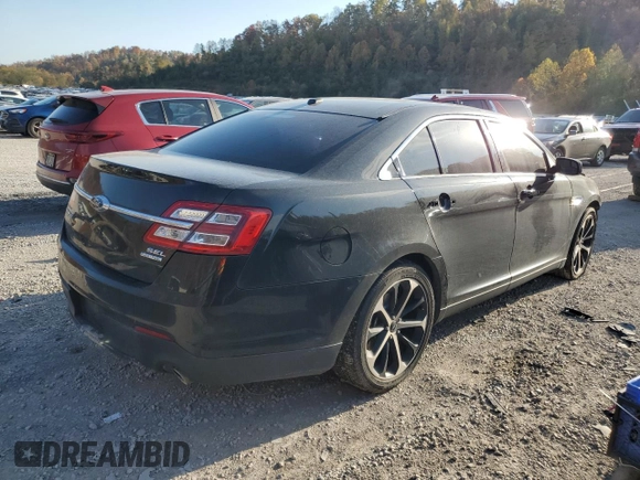 2015 Ford Taurus SEL z VIN 1FAHP2E85FG151155, wystawiony jako Copart lot #77791634 z przebiegiem 224 144 mil mil oraz Szkody całkowita. Historia ofert i sprzedaży dostępna na DreamBid. Obrazek 3.