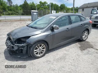 2017 Ford Focus SE with VIN 1FADP3F2XHL201380, listed as a Copart auction lot 56942815 with 136,169 mi miles and Salvage title. Bid and sale history available at DreamBid. Image 1.