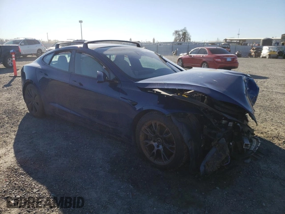 2022 Tesla Model S z VIN 5YJSA1E55NF475989, wystawiony jako Copart lot #88104975 z przebiegiem Nie podano mil oraz Szkoda całkowita • Salvage title. Historia ofert i sprzedaży dostępna na DreamBid. Obrazek 4.