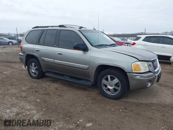 2005 GMC Envoy SLT with VIN 1GKDT13S352129944, listed as a IAAI auction lot 41527180 with 188,541 mi miles. Bid and sale history available at carsss.com. Image 1.