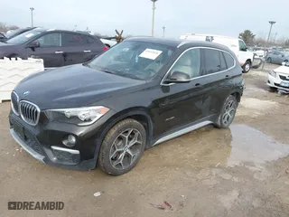2017 BMW X1 xDrive28i with VIN WBXHT3C38H5F70947, listed as a IAAI auction lot 41652626 with 76,843 mi miles. Bid and sale history available at carsss.com. Image 18.