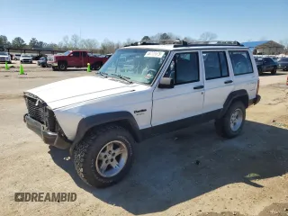 1995 Jeep Cherokee Sport with VIN 1J4FJ68S0SL646747, listed as a Copart auction lot 48772675 with 239,834 mi miles and Salvage title. Bid and sale history available at DreamBid. Image 1.