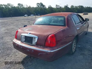 1998 Lincoln Town Car Signature z VIN 1LNFM82W8WY688852, wystawiony jako IAAI lot #42365729 z przebiegiem 194 232 mil mil oraz . Historia ofert i sprzedaży dostępna na DreamBid. Obrazek 4.