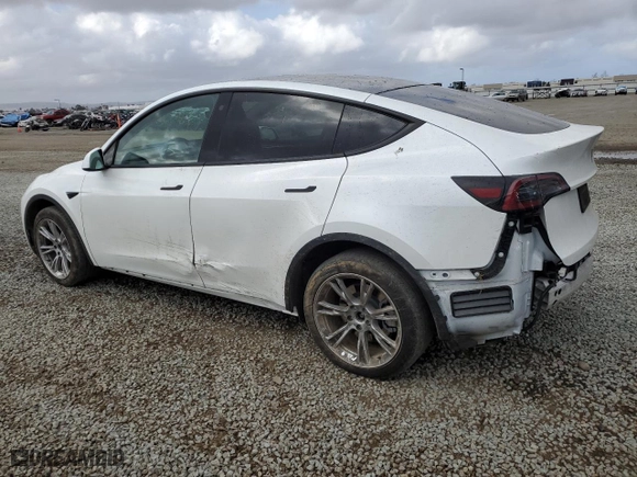 2023 Tesla Model Y Long Range with VIN 7SAYGDEE8PA069783, listed as a Copart auction lot 44635395 with 34,823 mi miles and Salvage Title. Bid and sale history available at carsss.com. Image 2.