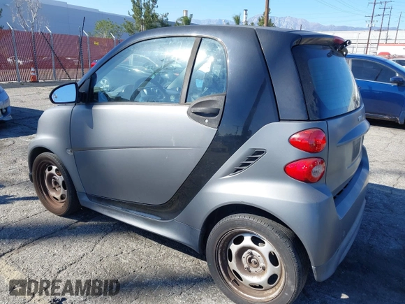 2013 Smart fortwo Pure с VIN WMEEJ3BA1DK647416, выставлен на аукционе IAAI как лот 41676693 с пробегом 102 772 миль миль и . История ставок и продаж доступна на DreamBid. Изображение 3.