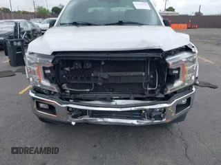 2018 Ford F-150 XL with VIN 1FTEW1CB4JKC87131, listed as a IAAI auction lot 42120579 with 93,143 mi miles. Bid and sale history available at carsss.com. Image 12.